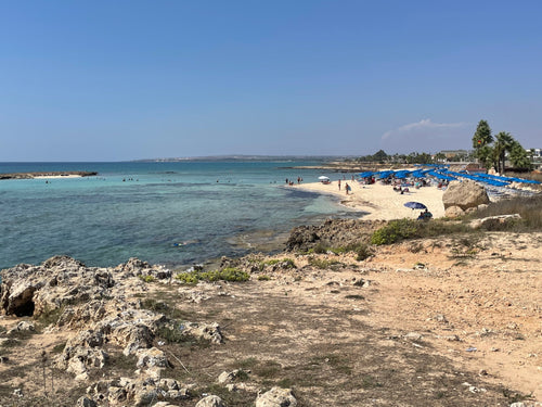 Calm turquoise sea and sandy beach